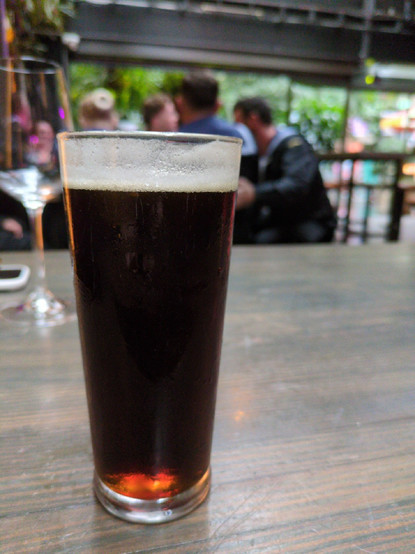 A glass of dark laget