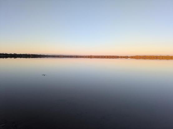 Mist across the water at Pink Lake.